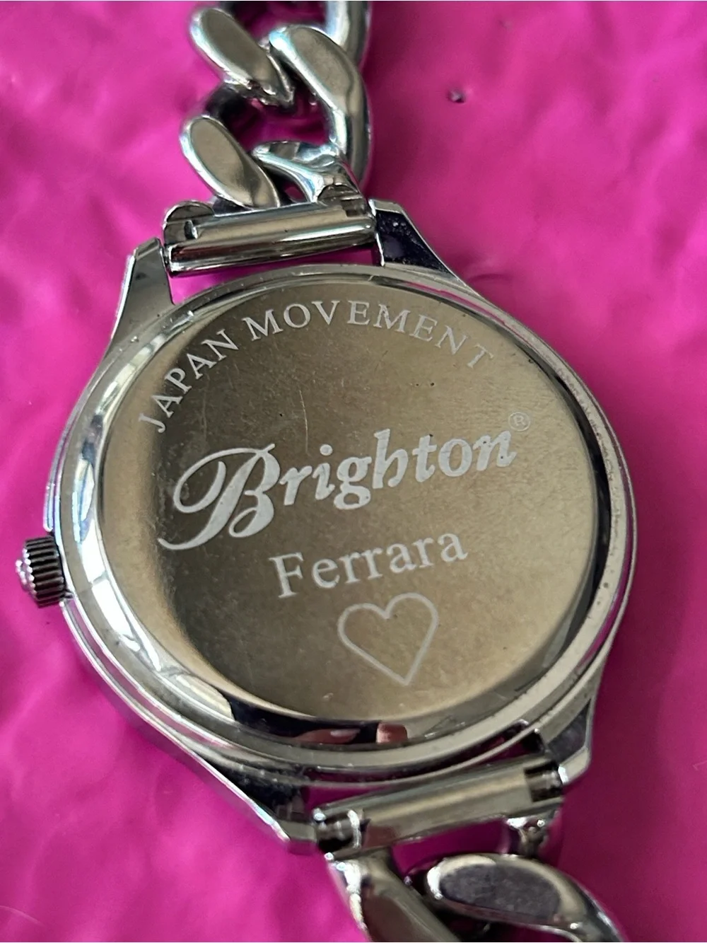 Brighton chain-link watch showcasing the ornate, scrollwork cut-out motif